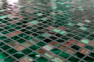 Gresite tiles on a spa wall. Squared background