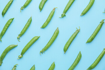 Tasty fresh peas on color background