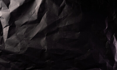 Texture of crumpled black paper. Creative vintage for design background.