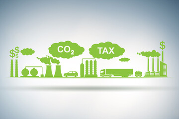Fototapeta premium Carbon tax concept with industrial plant