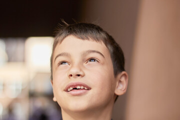 back to school portrait of a young boy with a backpack and a business suit