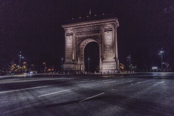 Fototapeta na wymiar Front view of Arch of Triumph at night 