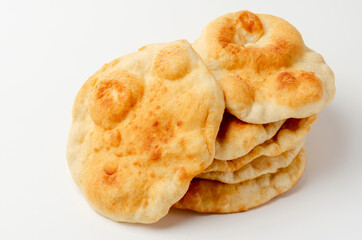 Navajo fried bread isolated on white background