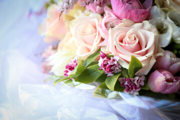 Fototapeta na wymiar Floral wedding bouquet in natural garden setting