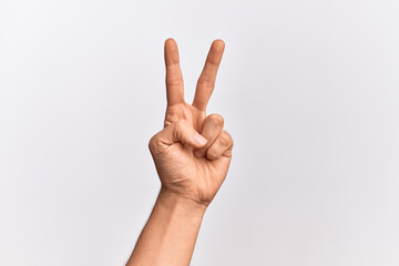 Hand of caucasian young man showing fingers over isolated white background counting number 2...
