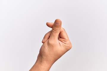 Hand of caucasian young man showing fingers over isolated white background holding blank space with thumb finger, business and advertising