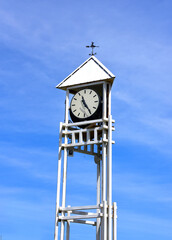 Clock Tower With Weather Vane