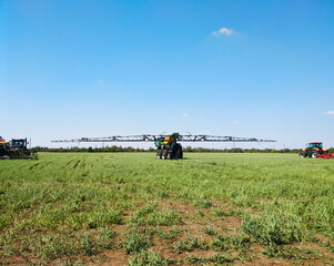 One type of agricultural work in the field. Sprayer. Irrigation equipment.