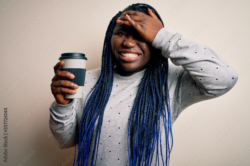 Sticker young african american plus size woman with braids drinking cup of takeaway coffee stressed with han