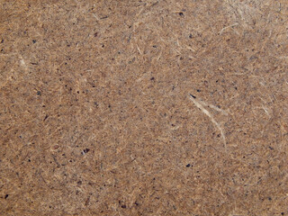 Close-up view of composite wood with visible abrasions