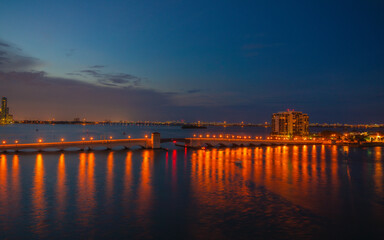 Fototapeta na wymiar sunset at the pier miami florida sea reflection 