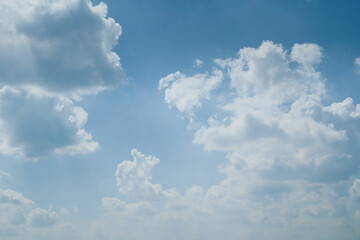 fluffy white cloud on clear blue sky