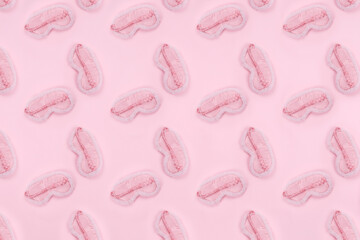 Pattern of cute pink fluffy sleep mask on pink drop. Sleep management and optimization, beauty sleep, beauty and sleep log concept. Place for text