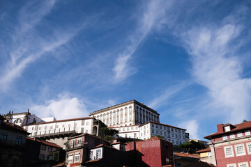 Fototapeta na wymiar Houses against the blue sky in the Porto downtown, Portugal.