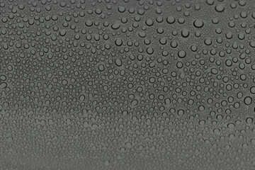 Bubble or drops of water on gray background.