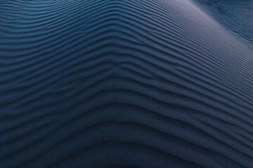 Fototapeta na wymiar Aerial view of ripples on sand dune at dusk