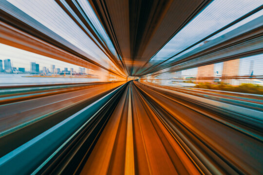 Abstract high speed technology POV train motion blurred concept from the Yuikamome monorail in Tokyo, Japan