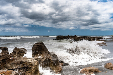 Fototapeta na wymiar stormy sea and rocks