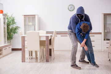 Child abduction concept with young boy