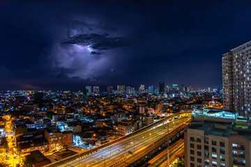 Fototapeta na wymiar Lightning strikes at night in Manila, Manila, Philippines, May 13, 2020