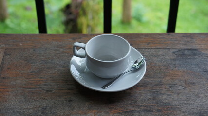 cup of coffee on wooden table