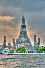 Naklejka premium A View of Wat Arun along the Chao Phraya River in Bangkok, Thailand (tonemapped)