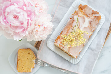 sweet home made elderflower sponge cake on a table