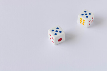 Dice on the light background. Close up. The concept of good luck in gambling.