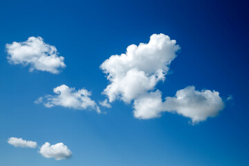 Naklejka na ściany i meble White, Fluffy Clouds In Blue Sky. Background From Clouds