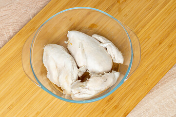 boiled poultry close up in a plate on the table