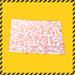 North Dakota closed - virus danger sign. Lock down US state icon. Black striped border around map with virus spread concept. Vector illustration.