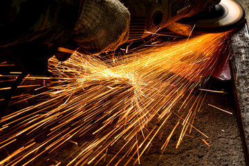 worker welding steel