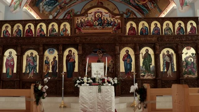Pulpit & wall painting in traditional Orthodox church, panning