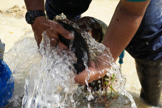 Burst pipe at ductile iron main pipe is under repairing
