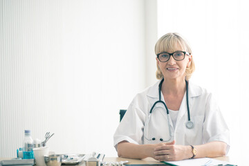 doctor and nurse with medical stethoscope in hand the hospital. Healthcare and medicine, patient concept.  