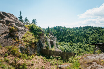 Fototapeta na wymiar Remains of the rocks of the city of Tustan fortress in the Carpathian mountains