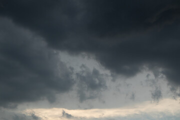 Fototapeta na wymiar Dark angry clouds of an incoming storm.