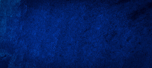 Dark classic blue watercolor background with torn strokes and uneven blurry paint. Abstract background for design, layouts and patterns.