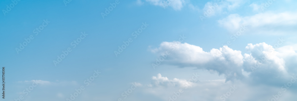 Wall mural blue sky background with tiny clouds. panorama