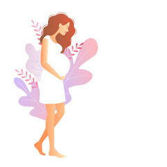 beautiful pregnant woman with hand on her stomach on a background of foliage. young woman stroking belly. Pregnancy.