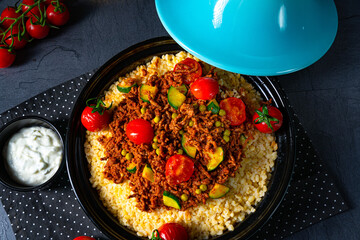 Tomato bulgur with vegetables and minced meat