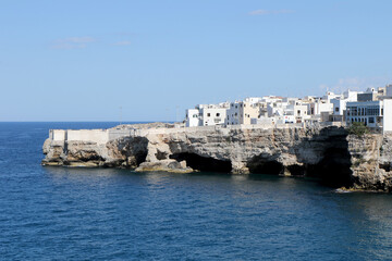 Overview of the coast and blue sea of Polignano a Mare, Puglia, Italy