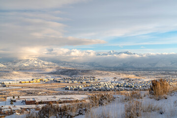 Mountain and residential neighborhood in Utah Valley on a snowy winter day