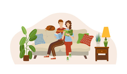 Couple in love reading books on sofa
