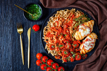Grilled chicken breast with linguine, top view