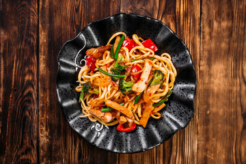 Asian cuisine vegetables udon noodles wok