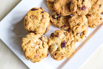 homemade Freshly baked Delicious Chocolate Chip Cookies on white plate