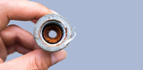 Embolism: A pipe clogged with sediment rust. Dicut with clipping path and white background.