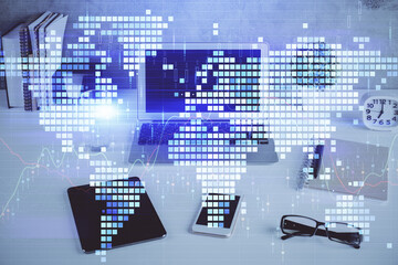 Double exposure of business theme icons and work space with computer background. Concept of success.