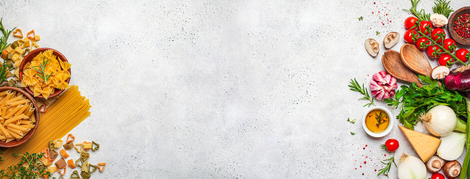 Banner raw uncooked ingredients for cooking pasta. Cooking background. Food banner. Healthy eating concept.